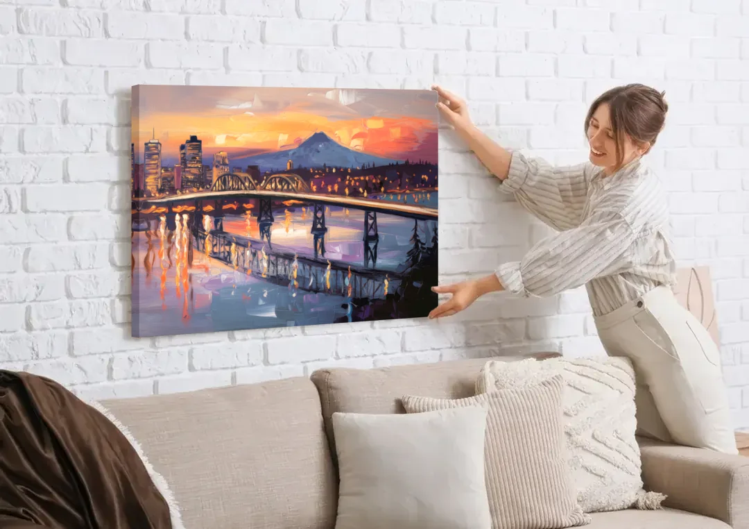Portland Cityscape At Dusk canvas wall art being hung on a white brick wall above a sofa