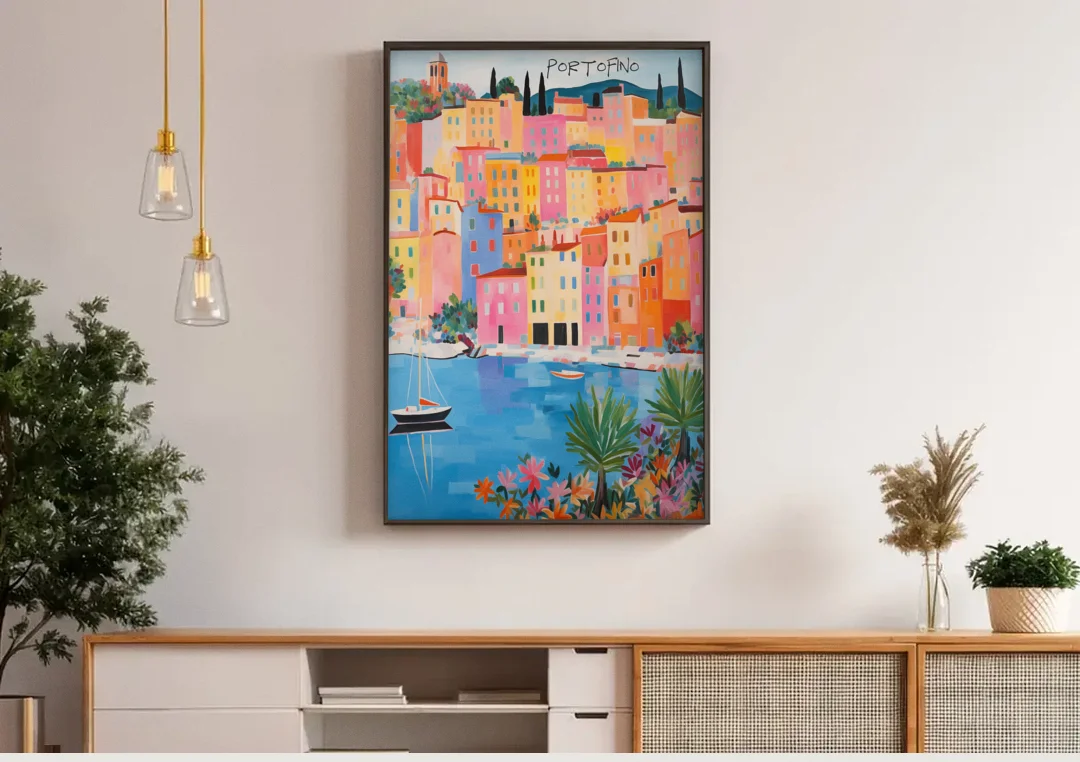 Portofino Art of Pastel Harbor Houses canvas wall art above a wooden sideboard under pendant lights