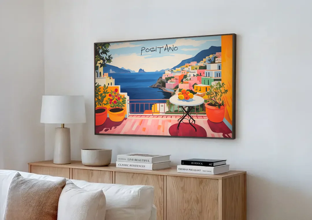 Positano Art of a Sunny Terrace canvas wall art above a wooden sideboard next to a sofa