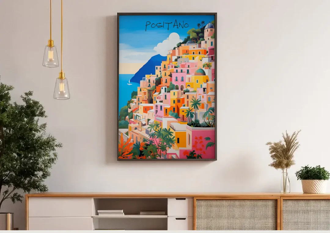 Positano Painting of Cliffside Houses canvas wall art above a wooden sideboard under pendant lights