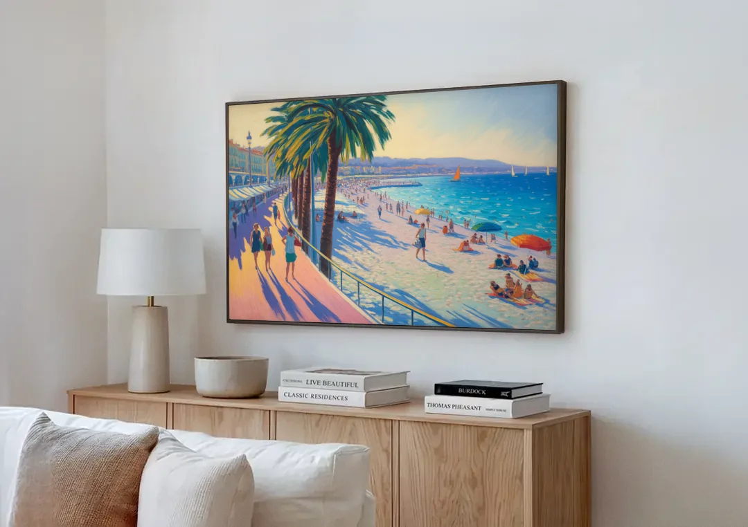 Promenade des Anglais canvas wall art above a wooden sideboard next to a sofa