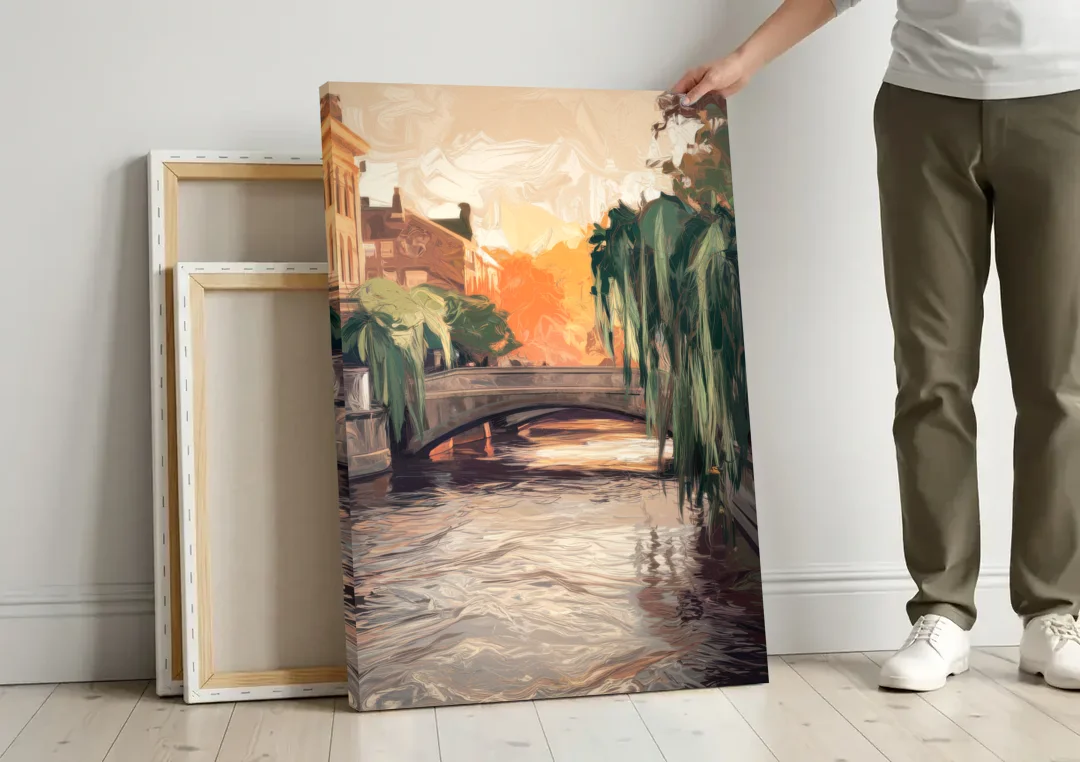 Providence Riverwalk Scene canvas wall art leaning against a wall next to blank canvases