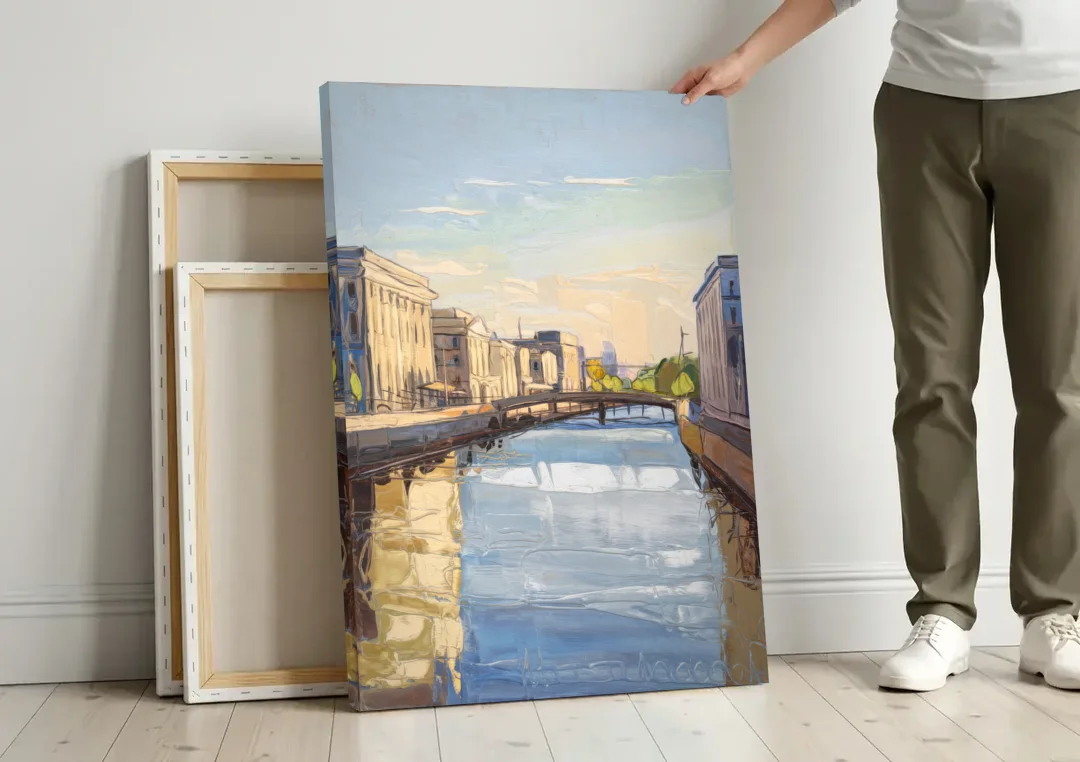 Providence Urban Landscape canvas wall art leaning against a wall next to blank canvases