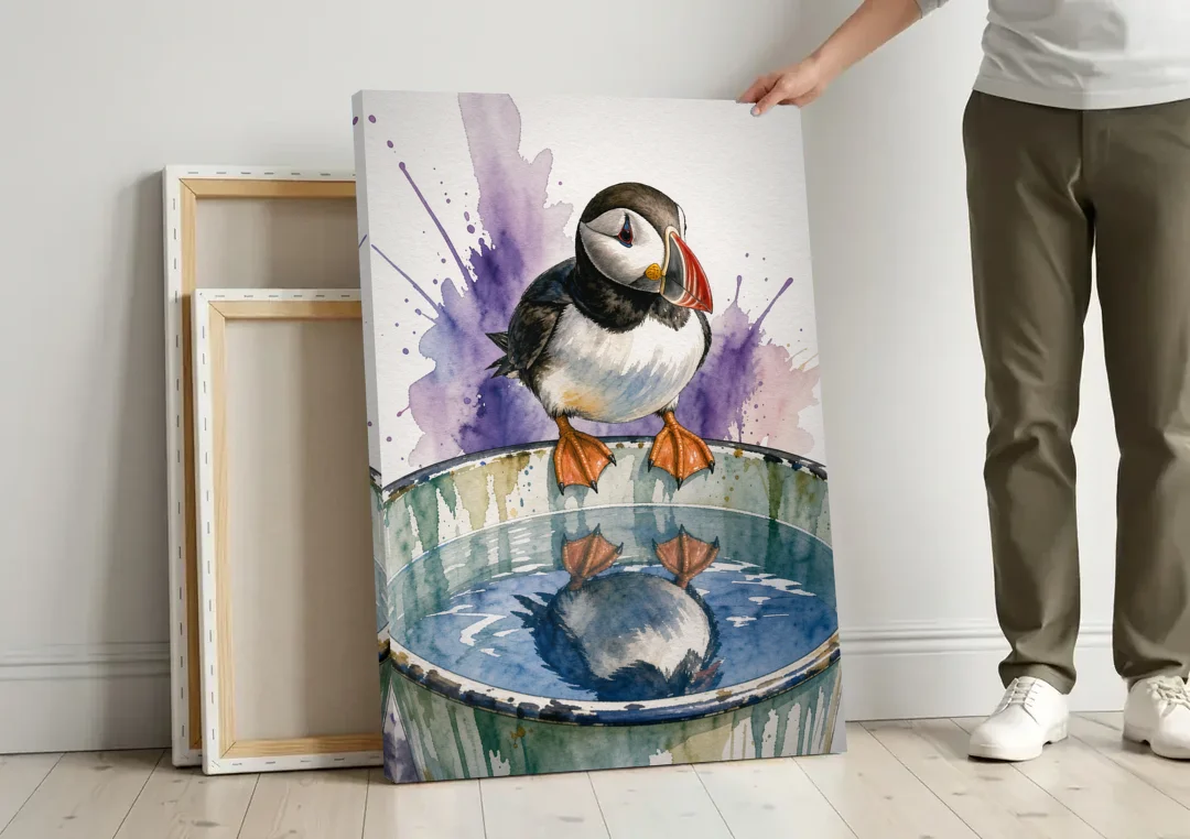 Puffin Admires Its Reflection in the Washtub canvas wall art leaning against a wall next to blank canvases