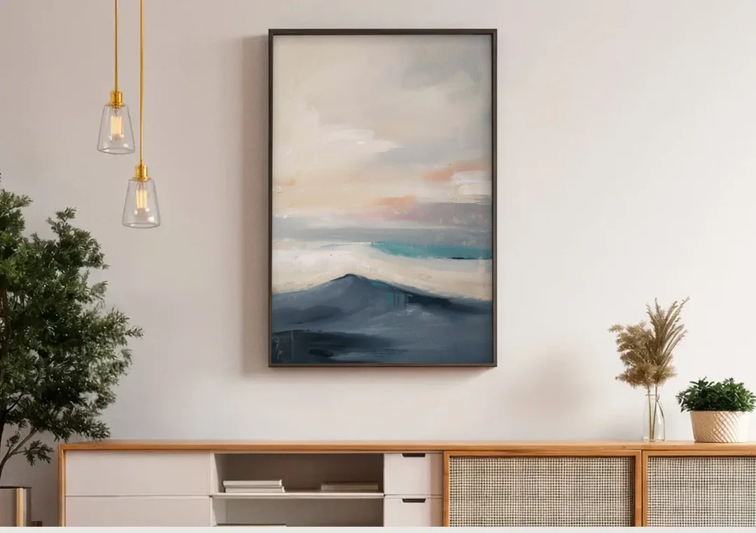 Minimalist Quiet Mountain Ridge with Teal Crest canvas wall art above a wooden sideboard under pendant lights