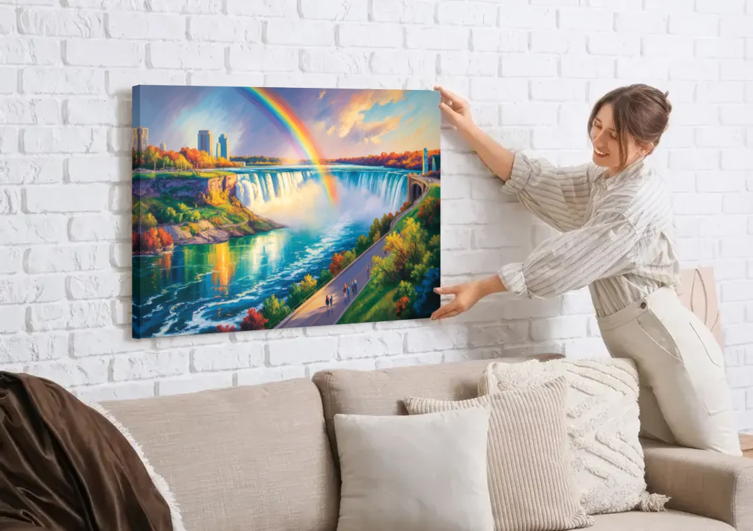 Rainbow Over Niagara Falls canvas wall art being hung on a white brick wall above a sofa