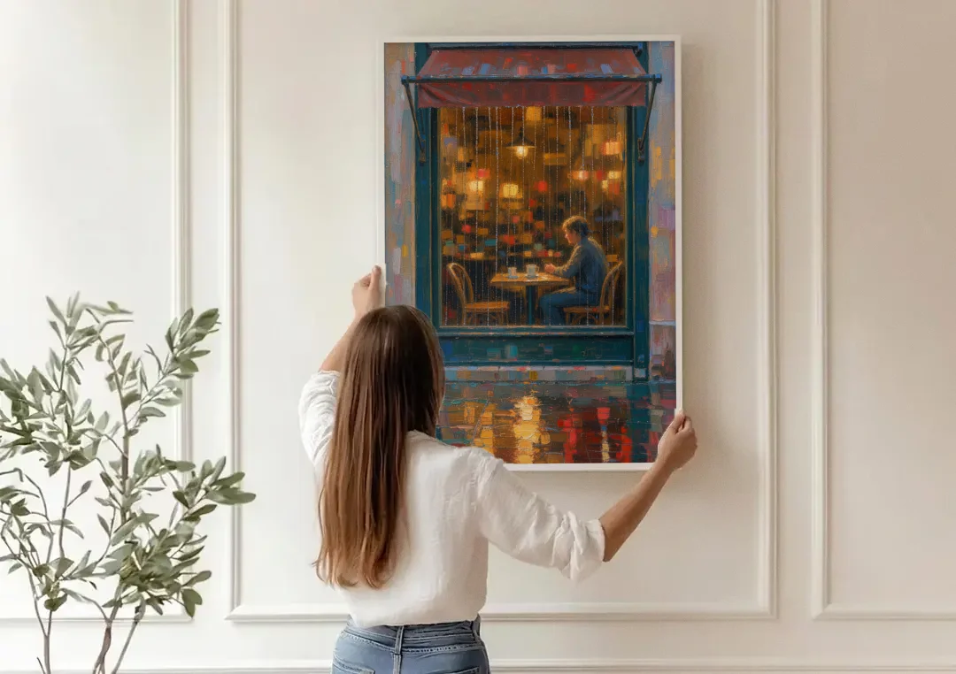 Rainy Cafe Painting of a Lone Window Table canvas wall art being hung on a paneled wall