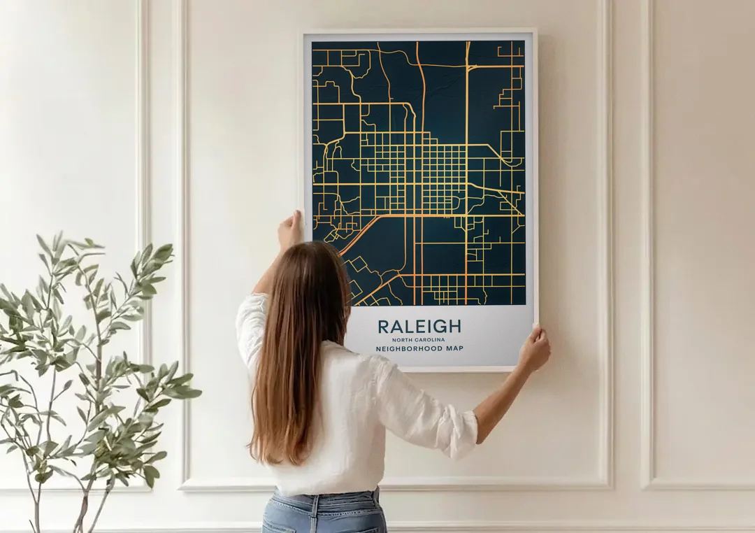Raleigh Neighborhood Map canvas wall art being hung on a paneled wall