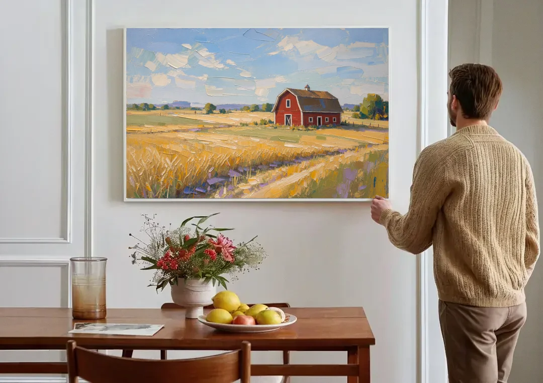 Red Barn Across Golden Grain Fields canvas wall art above a dining table