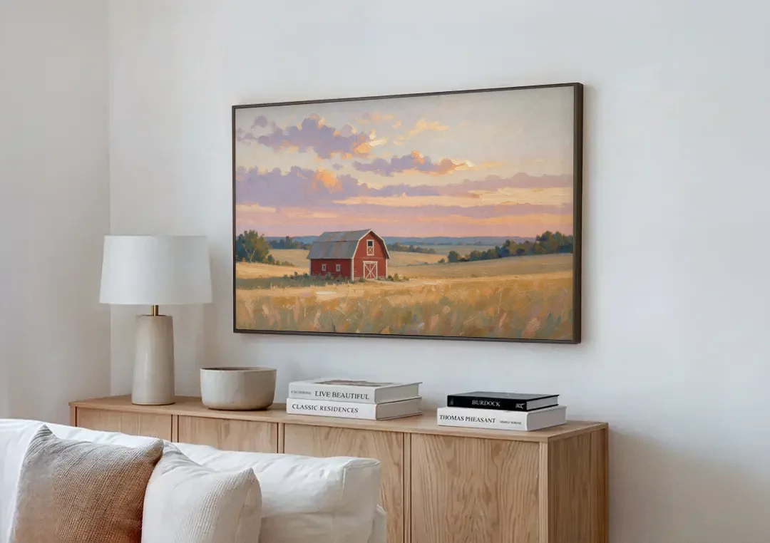 Red Barn Painting at Summer Dusk canvas wall art above a wooden sideboard next to a sofa