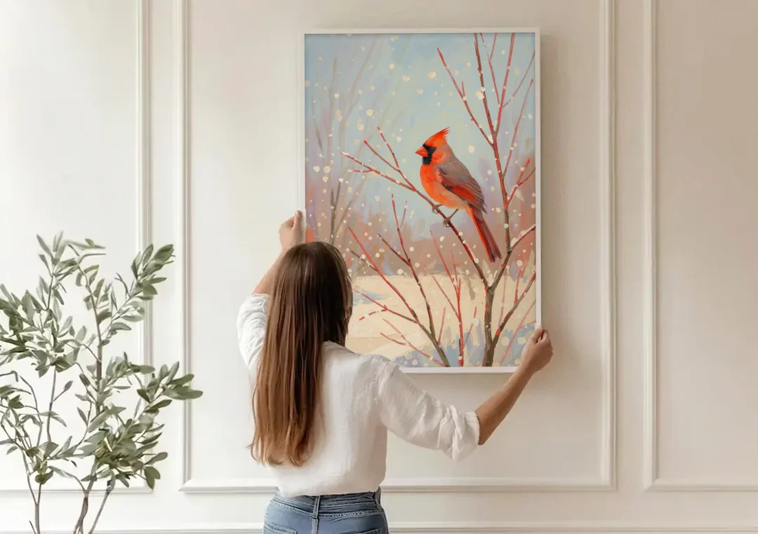 Winter Red Bird on Snowy Dogwood canvas wall art being hung on a paneled wall