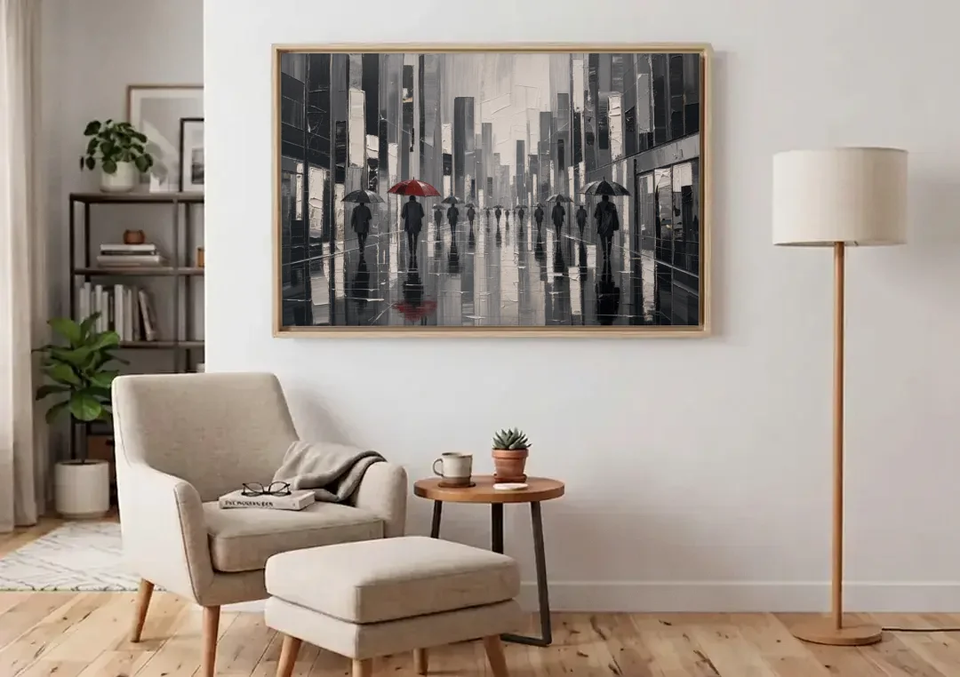 Red Black and White Wall Art of Rainy Streets canvas wall art above an armchair in a bright living room