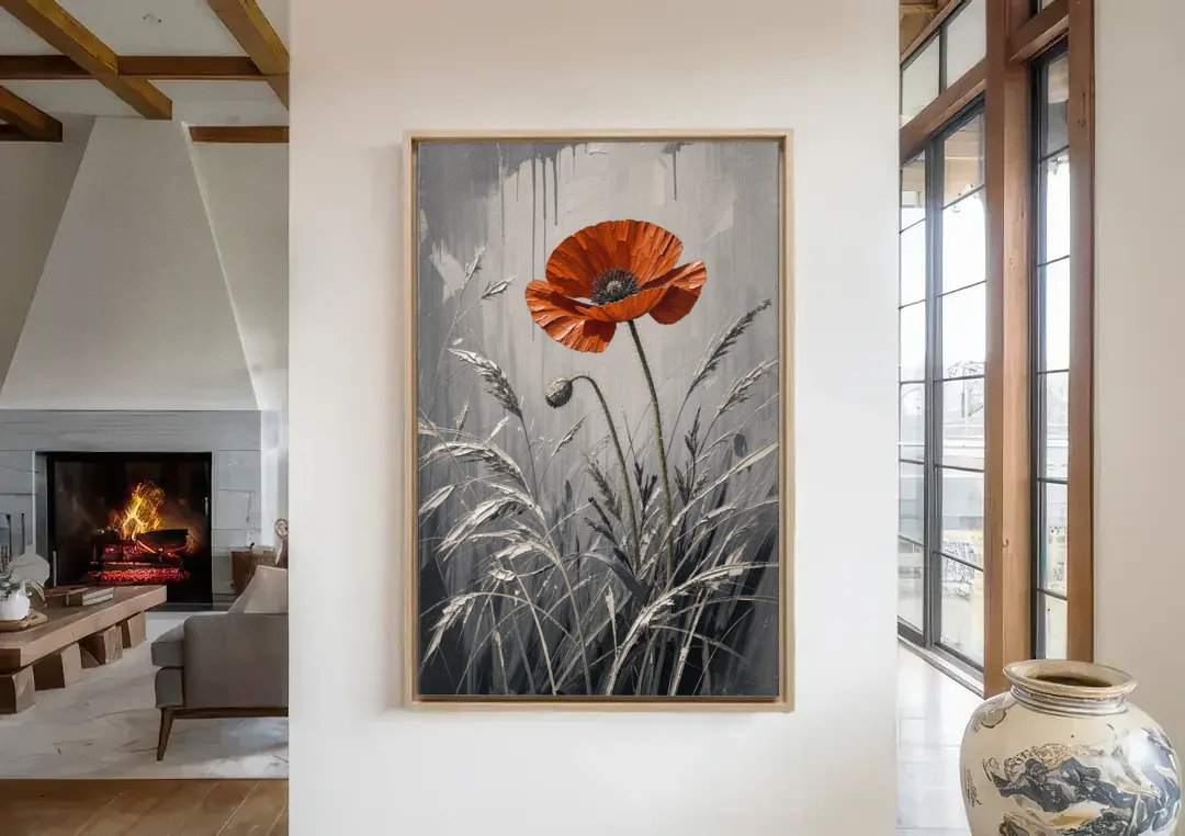 Red Black White Wall Art of a Lone Poppy canvas wall art in a living room with a fireplace