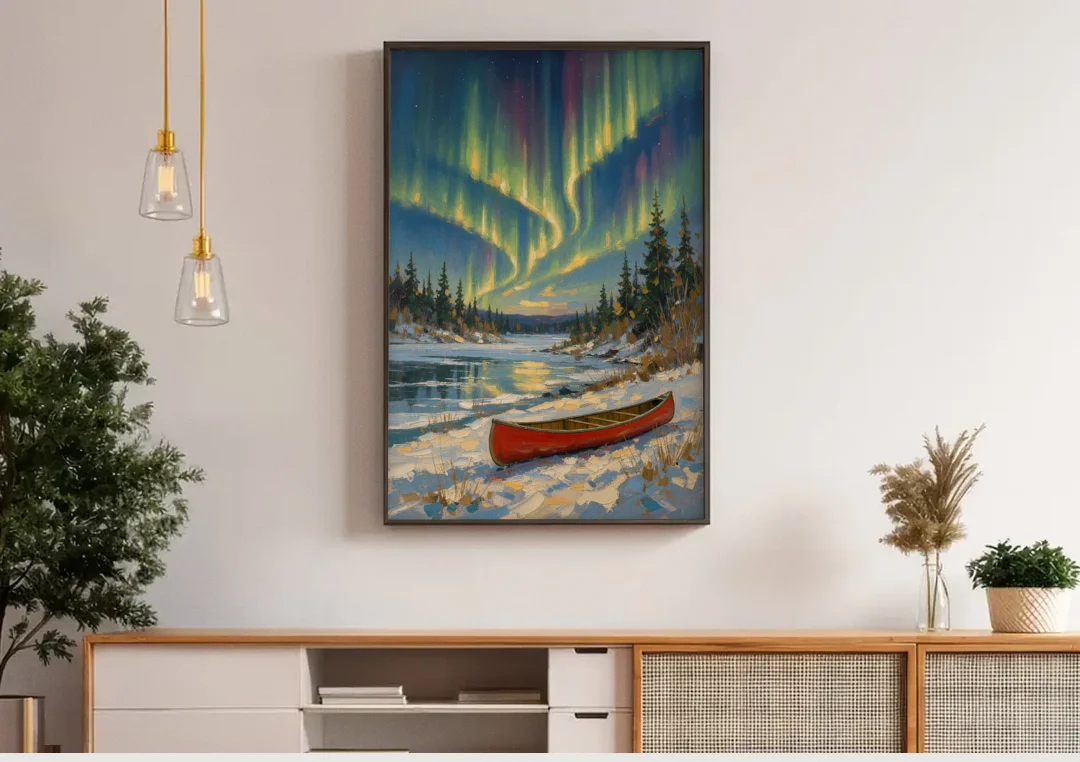 Red Canoe Under the Northern Lights canvas wall art above a wooden sideboard under pendant lights