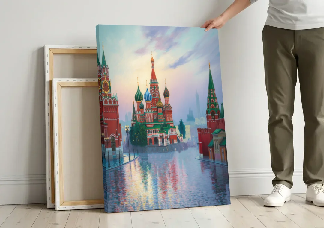 Red Square Reflections canvas wall art leaning against a wall next to blank canvases