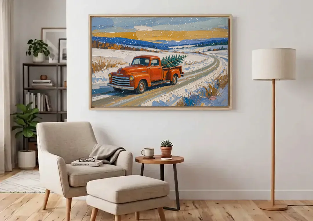 Red Truck Christmas Tree Painting on Country Road canvas wall art above an armchair in a bright living room