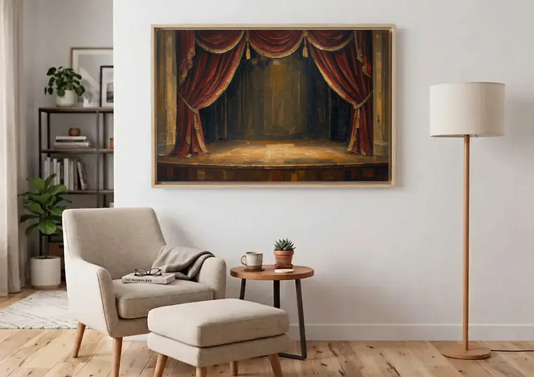 Red Velvet Curtains Framing an Empty Lit Stage canvas wall art above an armchair in a bright living room