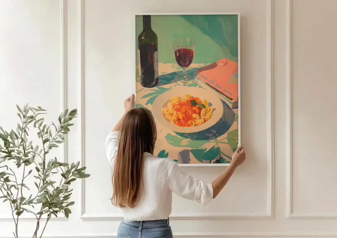 Red Wine Painting with Pasta and a Book canvas wall art being hung on a paneled wall