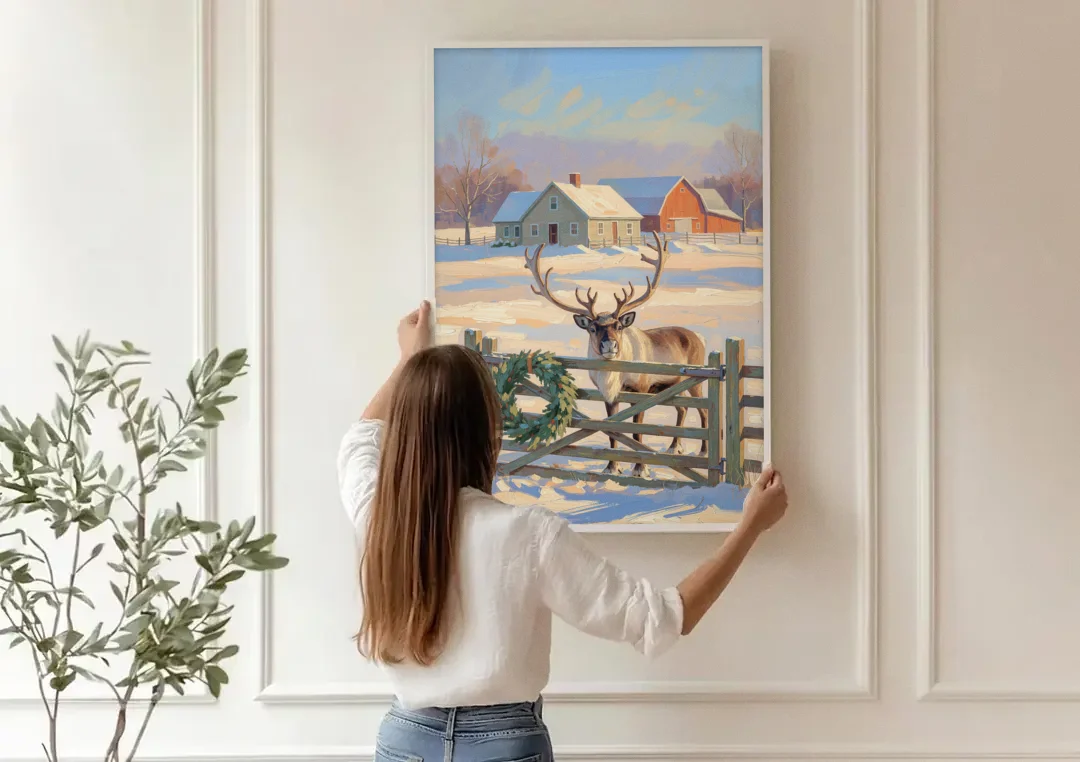 Reindeer at the Farmhouse Gate canvas wall art being hung on a paneled wall