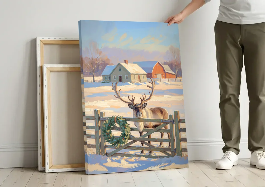 Reindeer at the Farmhouse Gate canvas wall art leaning against a wall next to blank canvases
