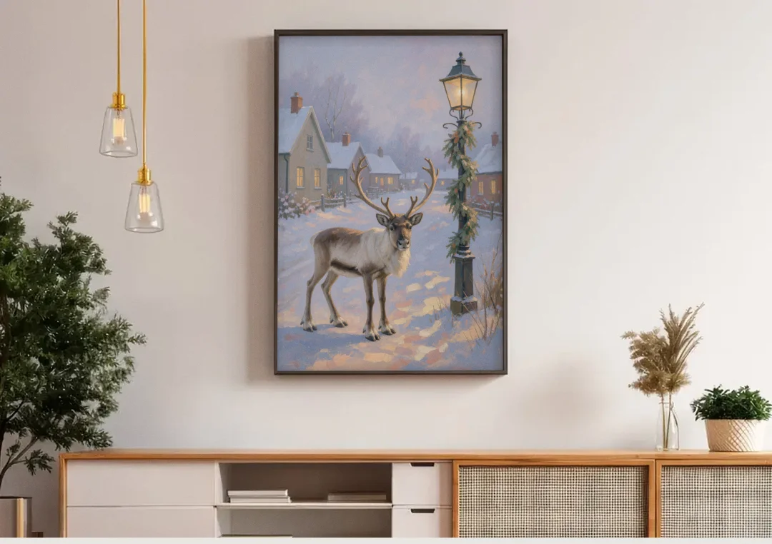 Reindeer by the Garland Lamp Post canvas wall art above a wooden sideboard under pendant lights