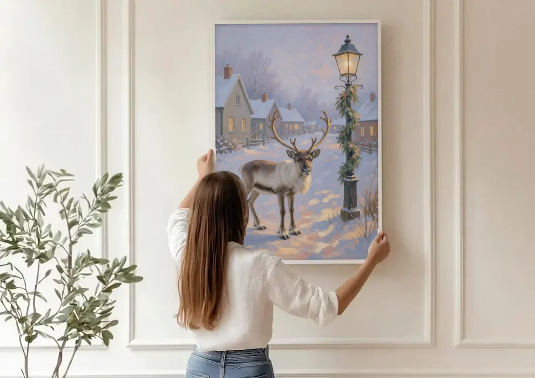 Reindeer by the Garland Lamp Post canvas wall art being hung on a paneled wall