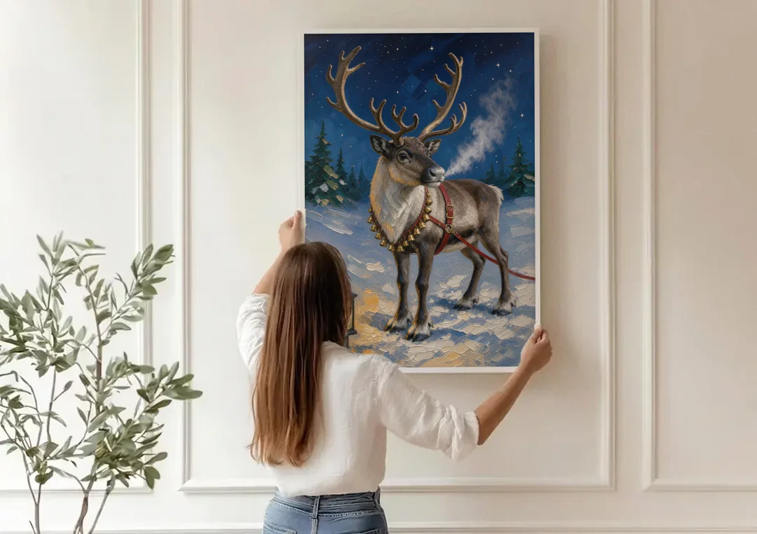 Reindeer Wall Art with Harness Bells and Lantern canvas wall art being hung on a paneled wall