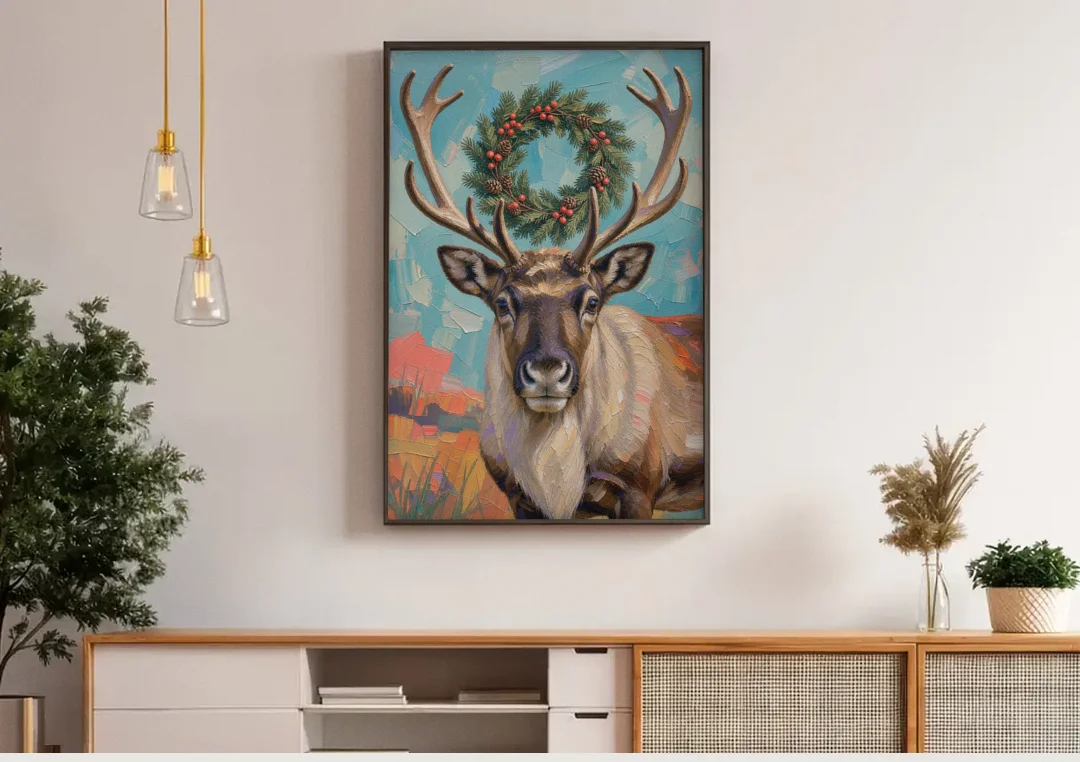 Reindeer with Evergreen Wreath on Antlers canvas wall art above a wooden sideboard under pendant lights
