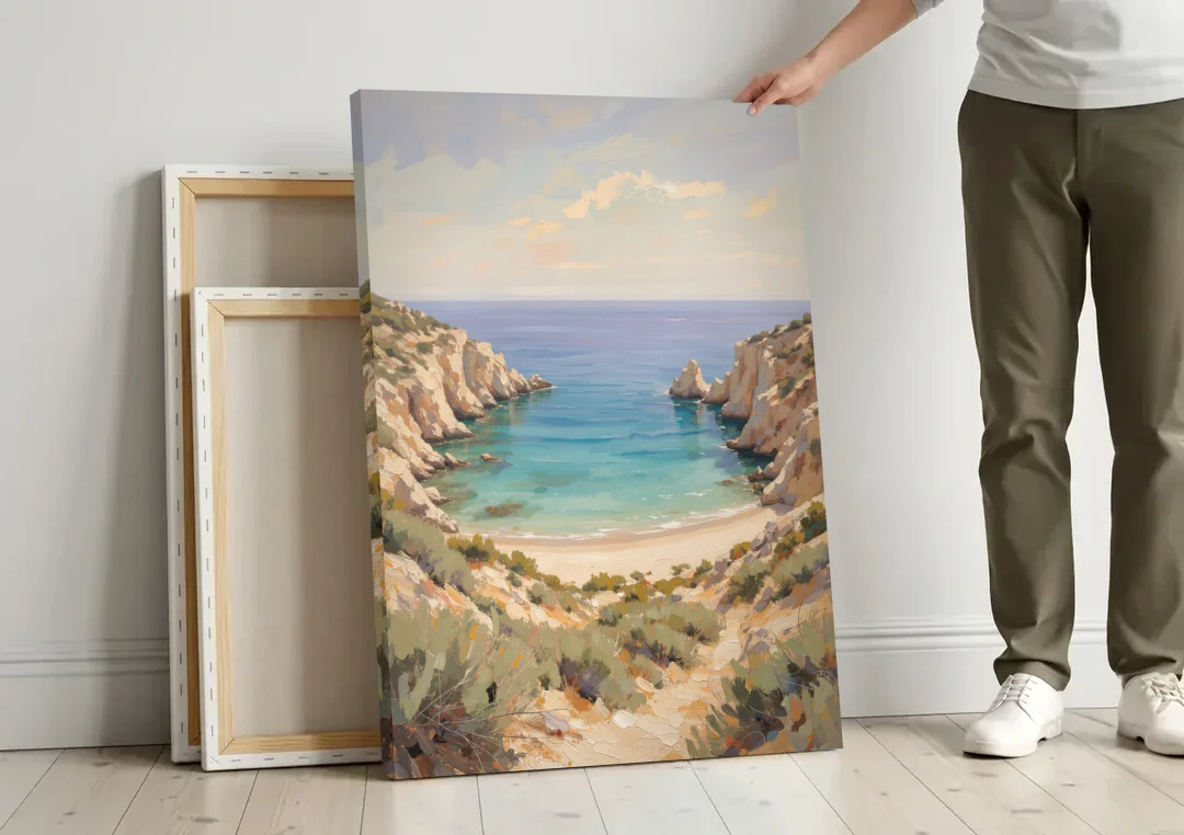 Relaxing Ochre Cliff Cove for the Spa Bathroom canvas wall art leaning against a wall next to blank canvases