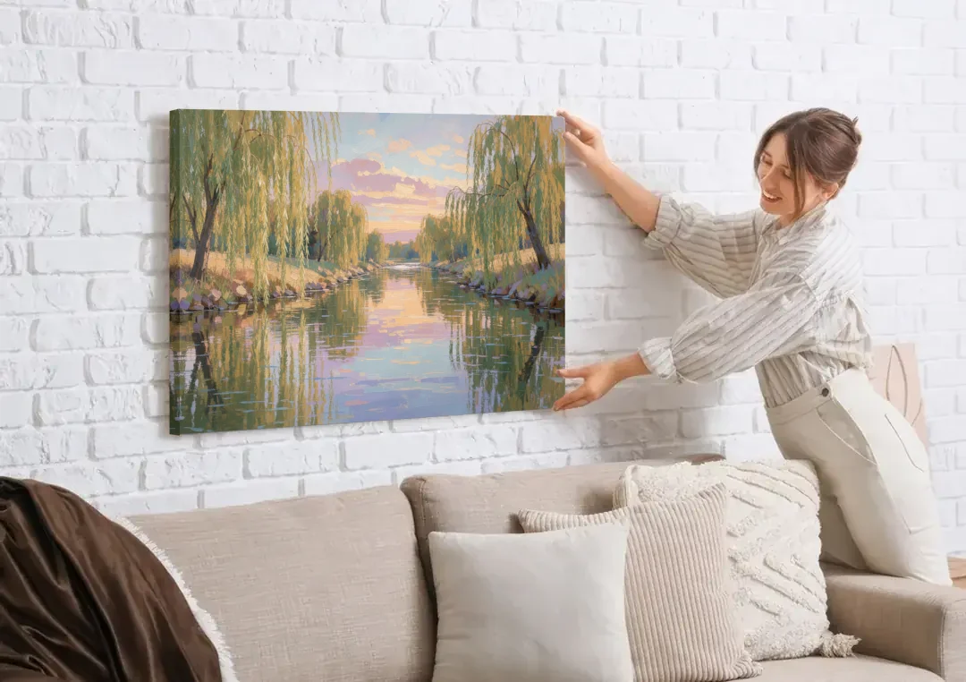 Relaxing Wall Art for Bedroom Willow River Glow canvas wall art being hung on a white brick wall above a sofa