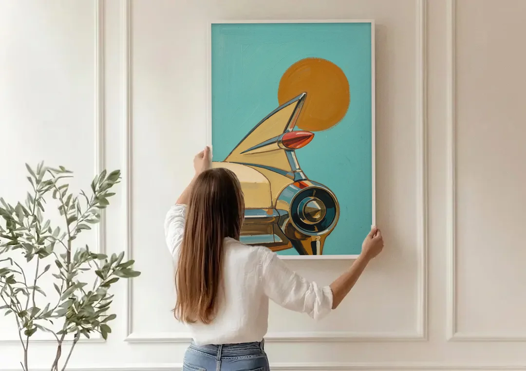 Retro Car Wall Art with Tailfin and Orange Sun canvas wall art being hung on a paneled wall