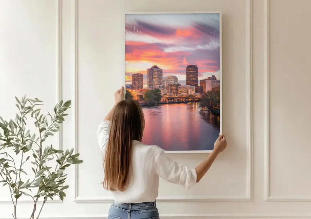 Richmond Skyline Sunset canvas wall art being hung on a paneled wall
