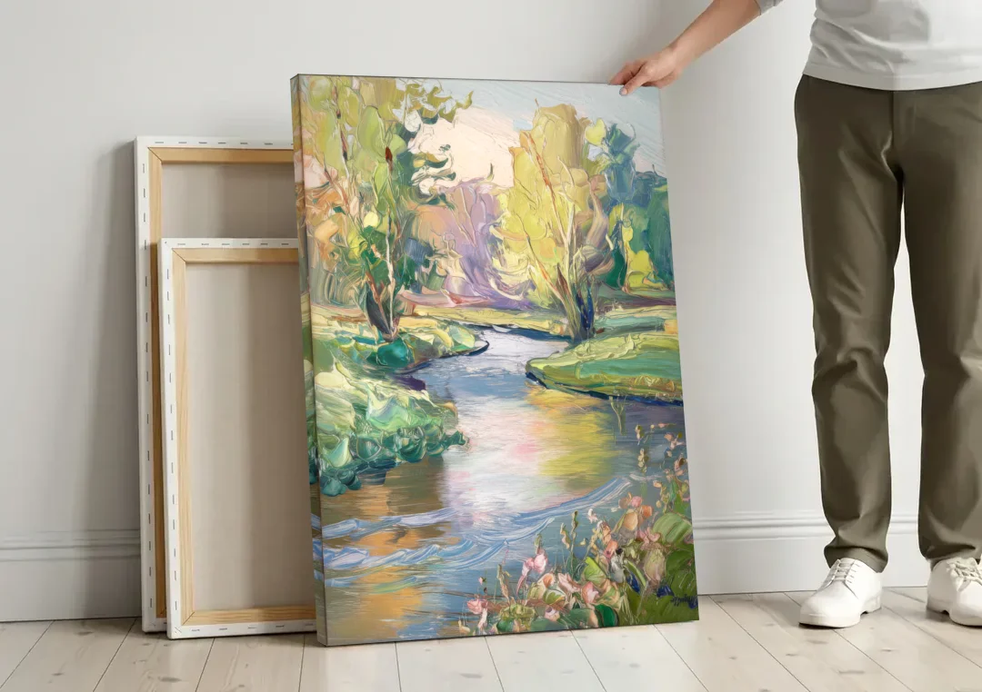 Riverside Artistic Riverfront canvas wall art leaning against a wall next to blank canvases