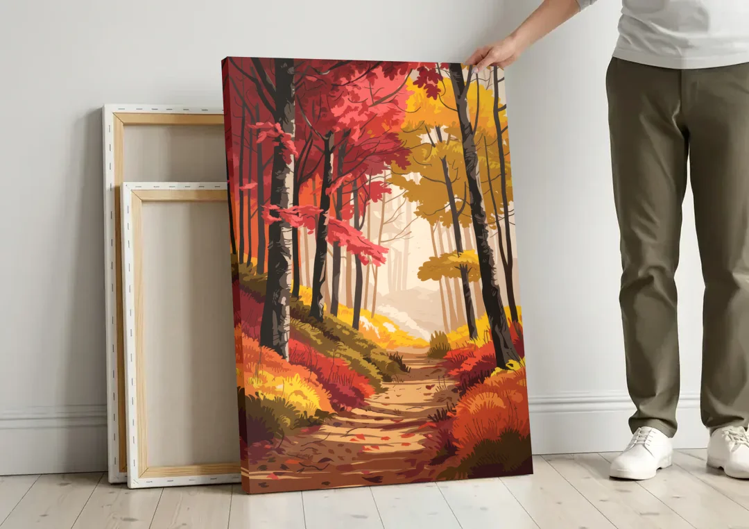 Rochester Autumn Foliage canvas wall art leaning against a wall next to blank canvases