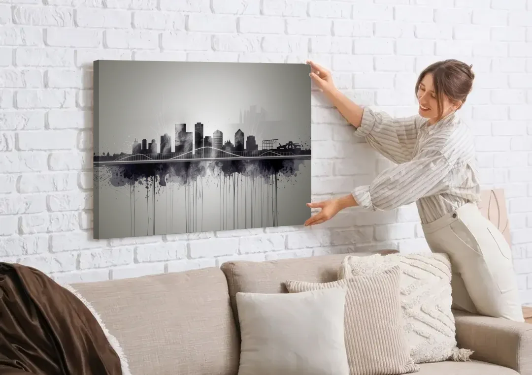 Rochester Cityscape Reflection canvas wall art being hung on a white brick wall above a sofa