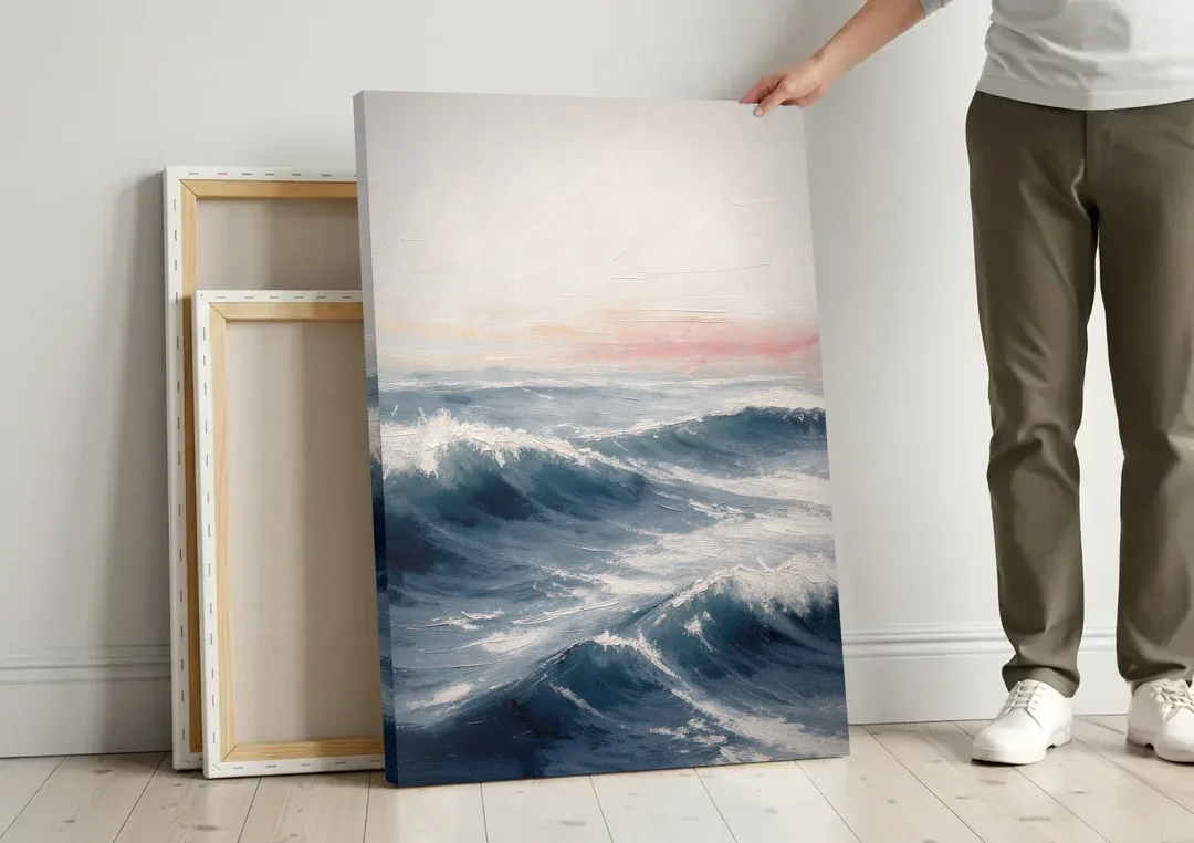 Rolling Navy Swells Under a Chalk Sky canvas wall art leaning against a wall next to blank canvases