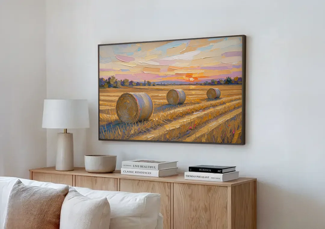 Round Hay Bales on a Golden Harvest Field canvas wall art above a wooden sideboard next to a sofa