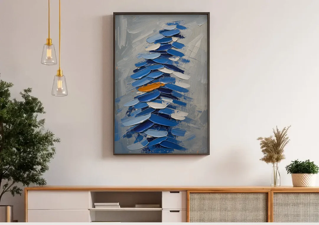 Royal Blue Abstract Painting of Stacked Knife Strokes canvas wall art above a wooden sideboard under pendant lights