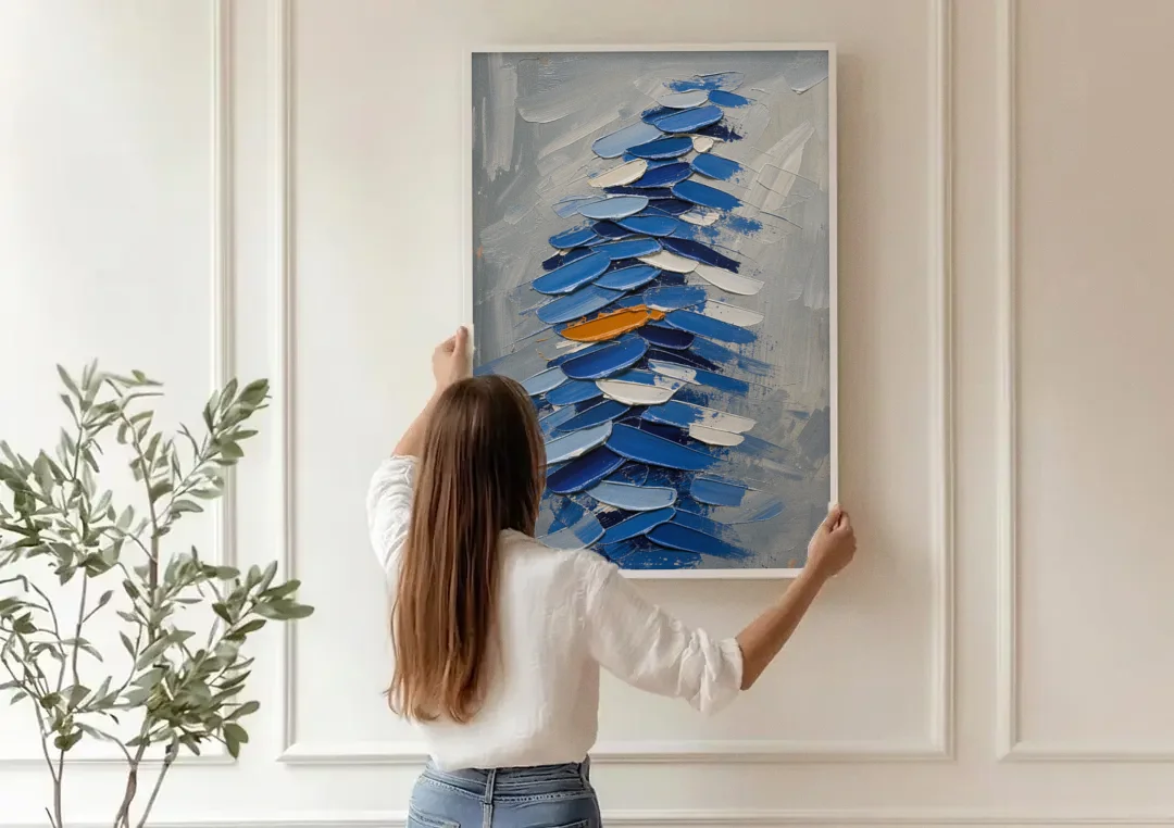 Royal Blue Abstract Painting of Stacked Knife Strokes canvas wall art being hung on a paneled wall