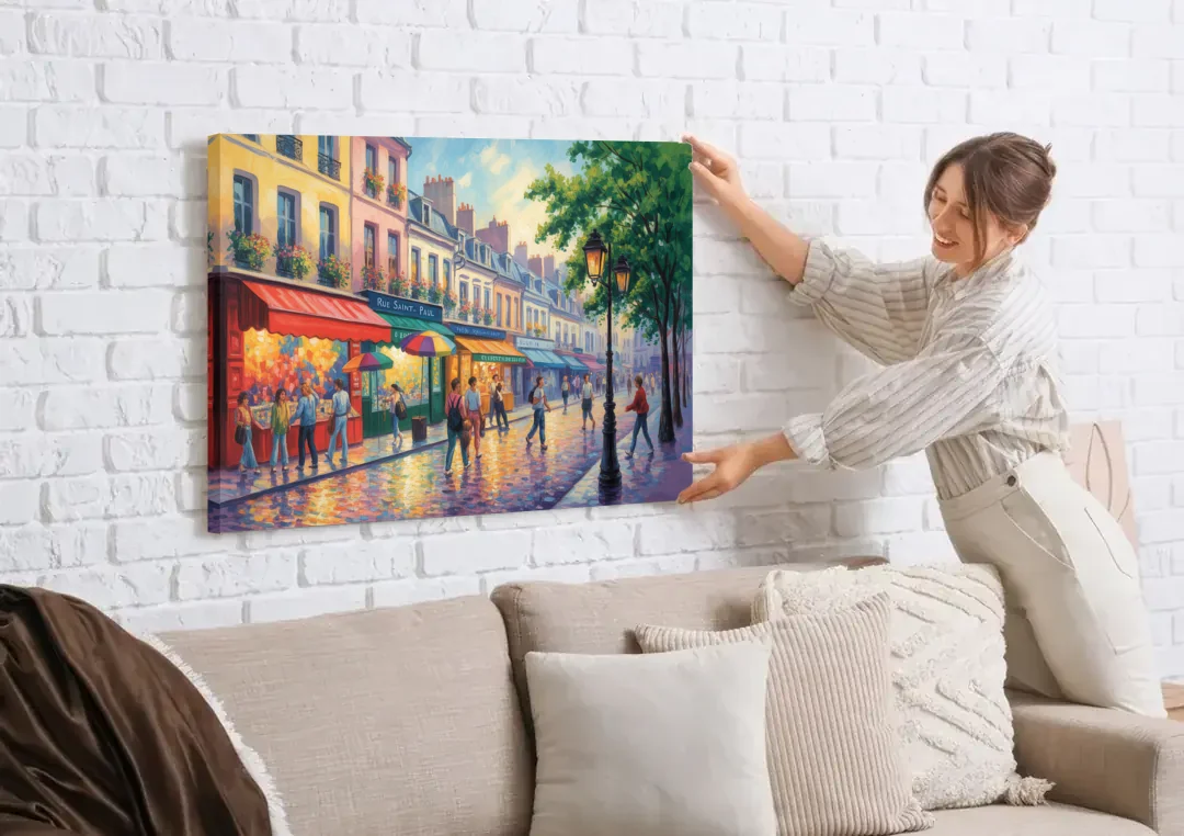 Rue Saint Paul Vibes canvas wall art being hung on a white brick wall above a sofa