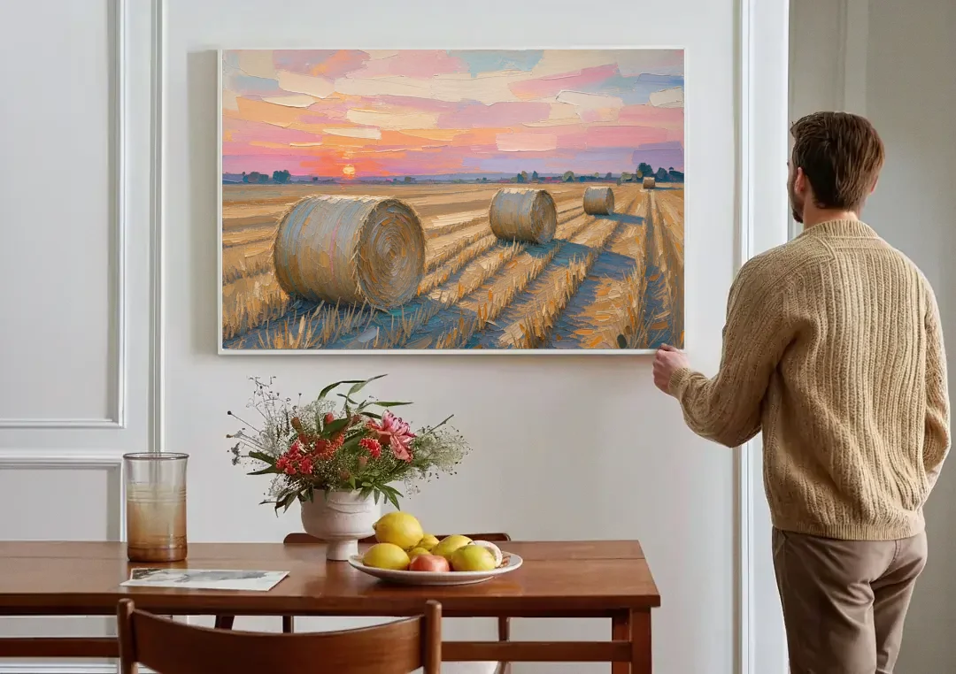 Rural Landscape Painting of Hay Bales at Sunset canvas wall art above a dining table