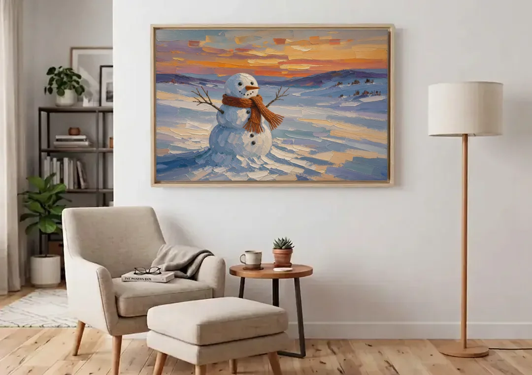 Rust Scarf Snowman at Dusk in Winter canvas wall art above an armchair in a bright living room
