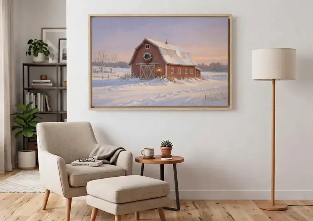 Rustic Christmas Wall Decor Red Barn at Dusk canvas wall art above an armchair in a bright living room