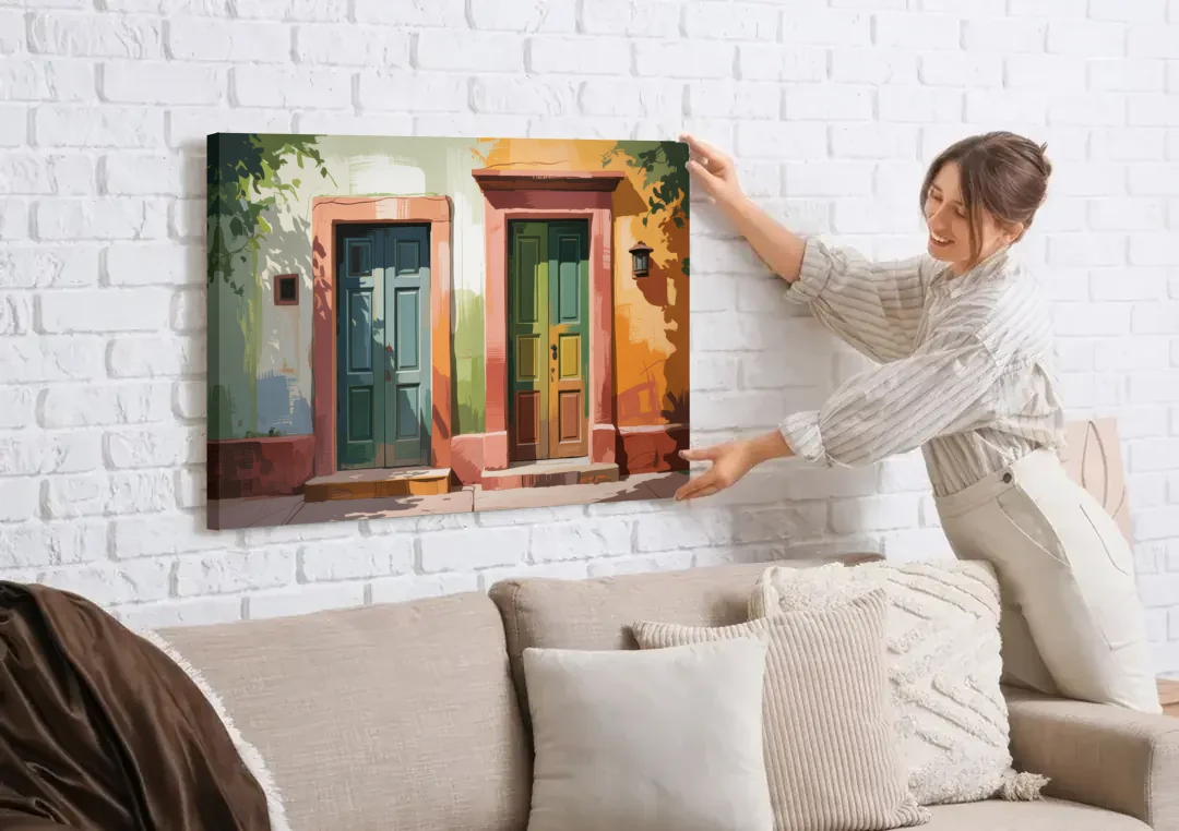 Rustic Colonial Doors canvas wall art being hung on a white brick wall above a sofa