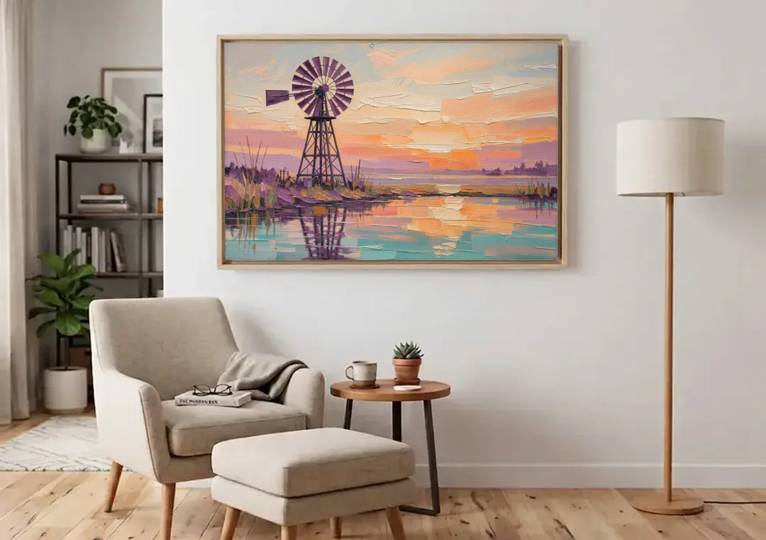 Rustic Wall Decor with a Windmill at Sunset canvas wall art above an armchair in a bright living room