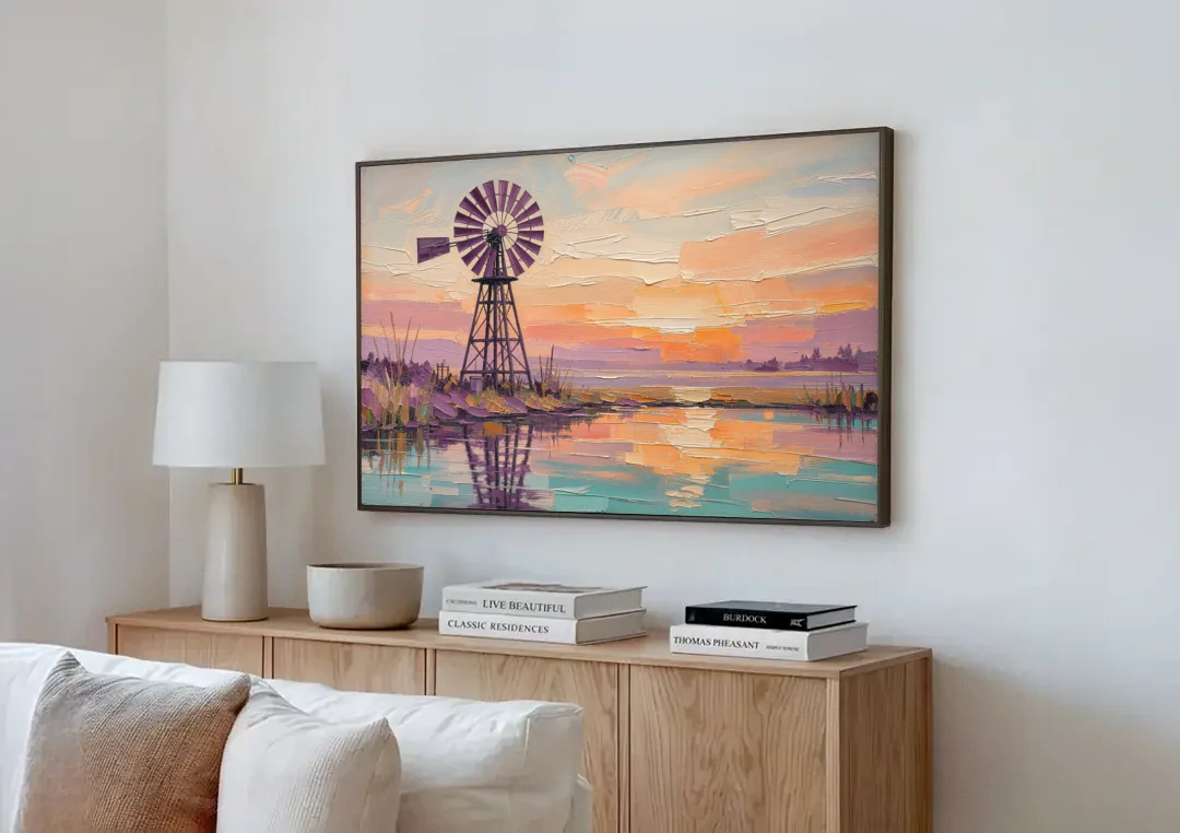 Rustic Wall Decor with a Windmill at Sunset canvas wall art above a wooden sideboard next to a sofa
