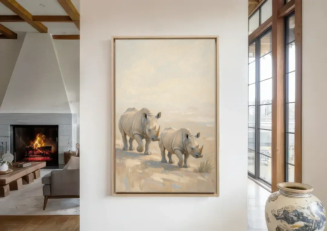 Safari Animal Nursery Prints Rhino Calf and Mother canvas wall art in a living room with a fireplace