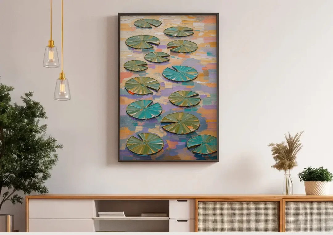 Sage and Teal Lily Pads on Peach Water canvas wall art above a wooden sideboard under pendant lights