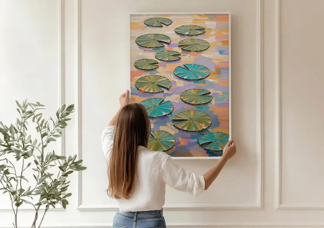 Sage and Teal Lily Pads on Peach Water canvas wall art being hung on a paneled wall