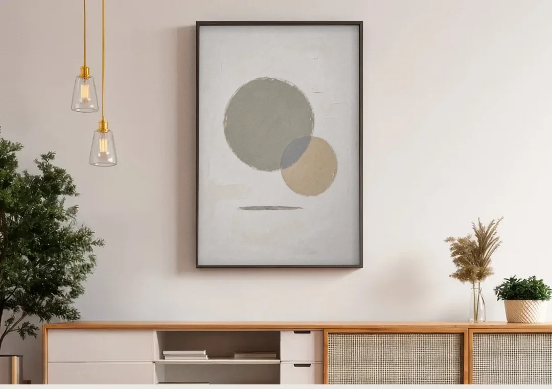 Sage Green Abstract Art with a Dry Grass Circle canvas wall art above a wooden sideboard under pendant lights